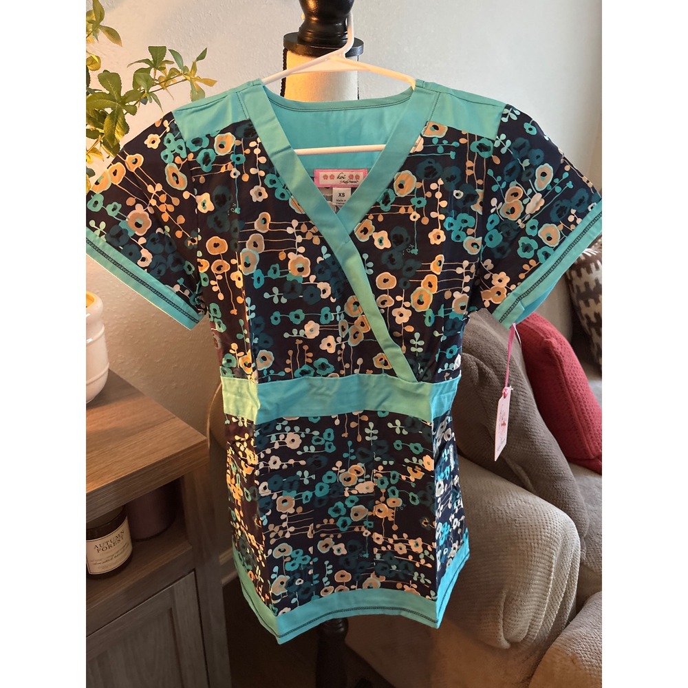 Koi NWT xs blue floral scrub top